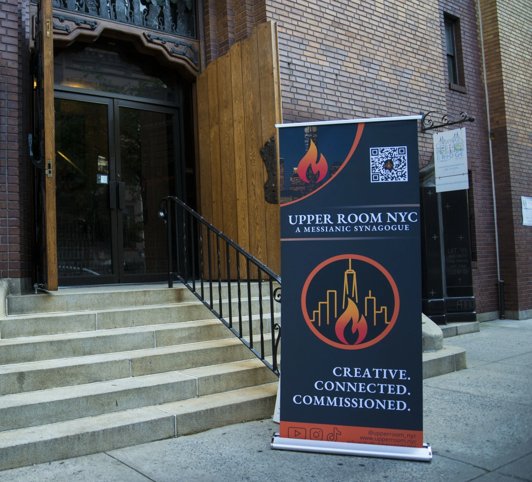 Upper Room NYC Messianic Synagogue entrance in Manhattan with welcome banner