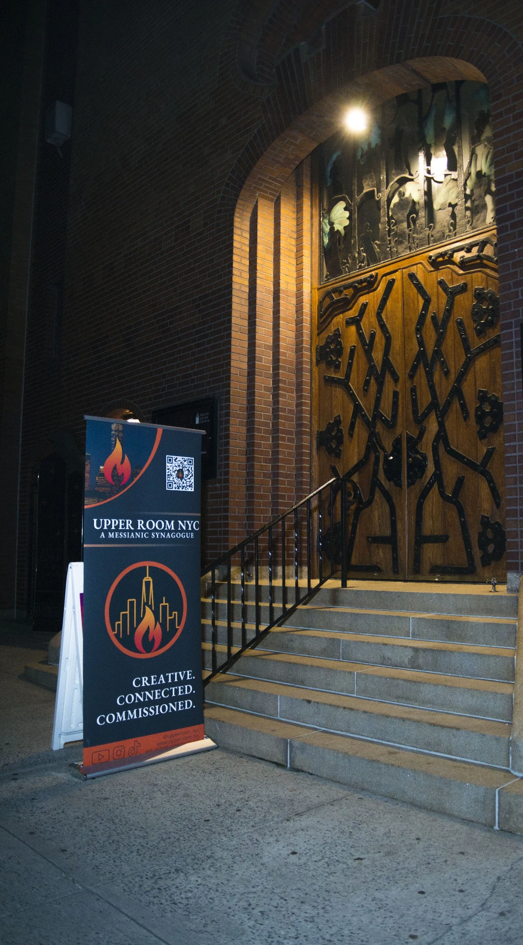Upper Room NYC Messianic Synagogue gathering space at night in Manhattan