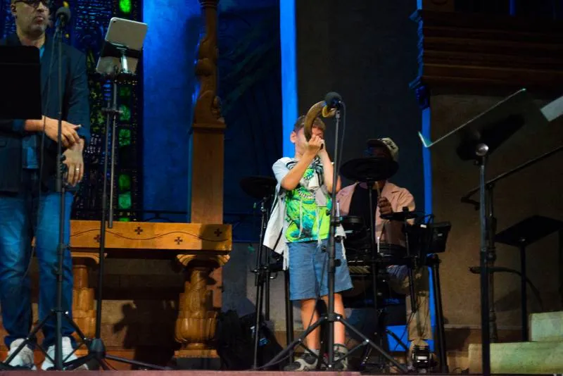 Boy blowing the shofar